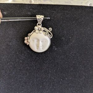Bali Legacy moon face pendant